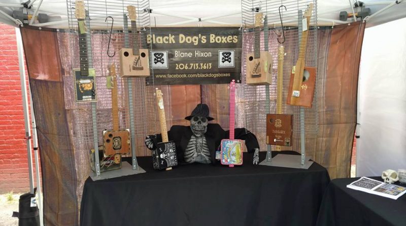 Cigar and lunch box guitar vendor Black Dog Boxes.